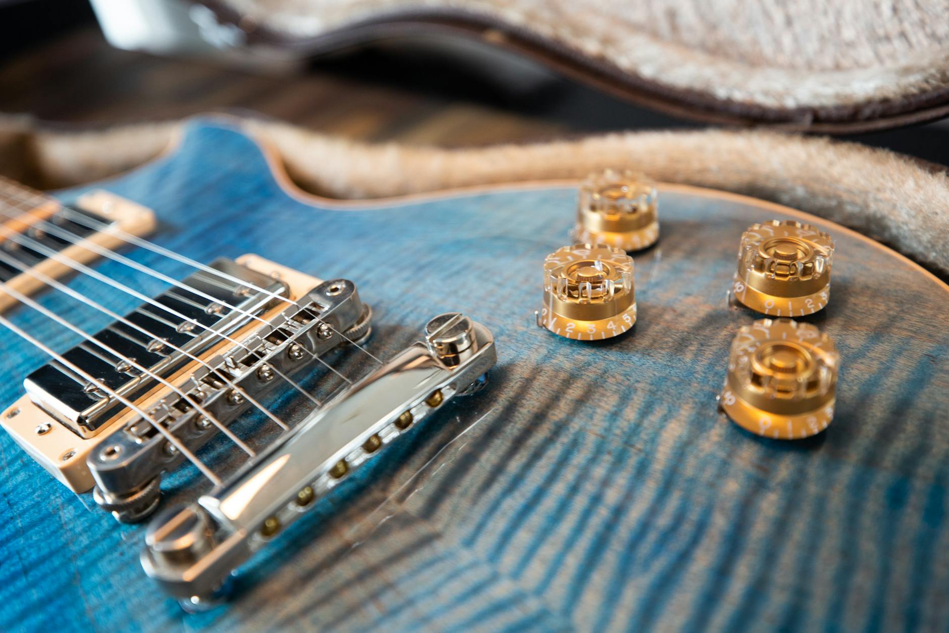 close up photo view of blue electric guitar